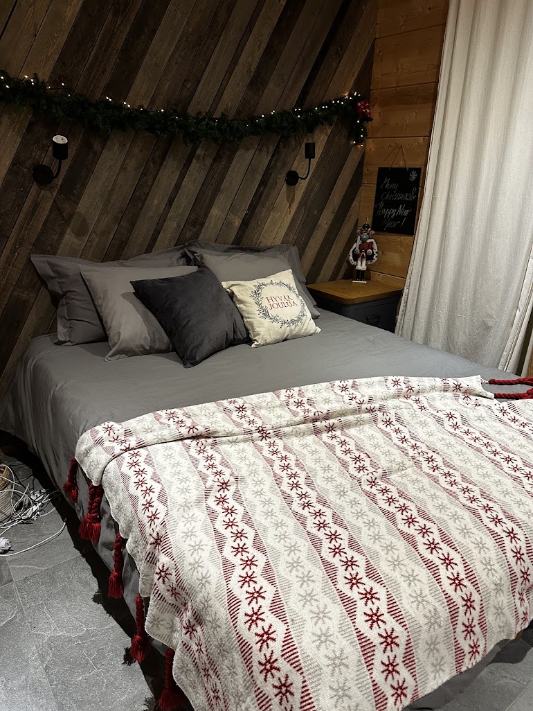 Family bedroom with warm bedding at Snow & Pine